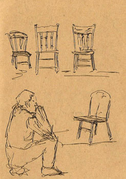 Some chairs and a guy.
